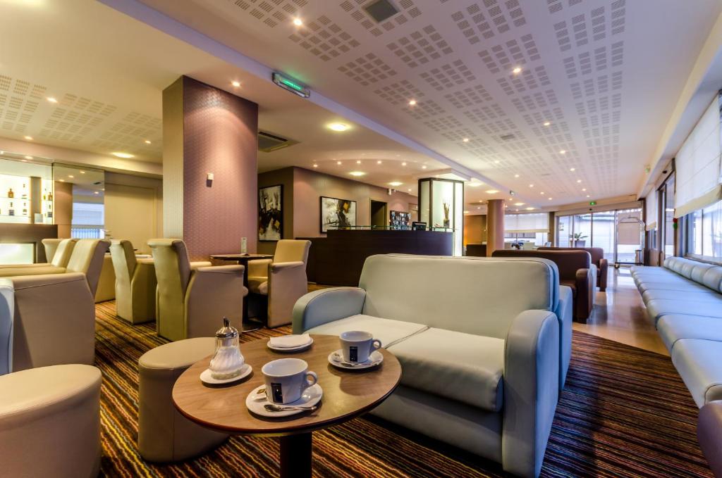 Posezení v ubytování Helgon Hotel - Lourdes Pyrénées