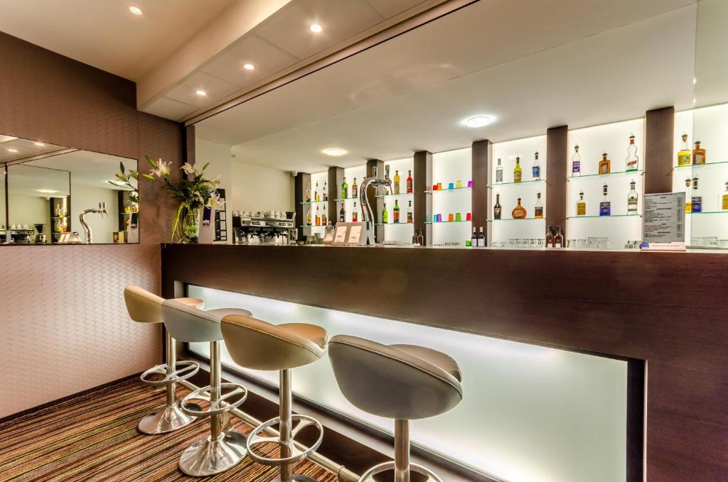 Lounge nebo bar v ubytování Helgon Hotel - Lourdes Pyrénées