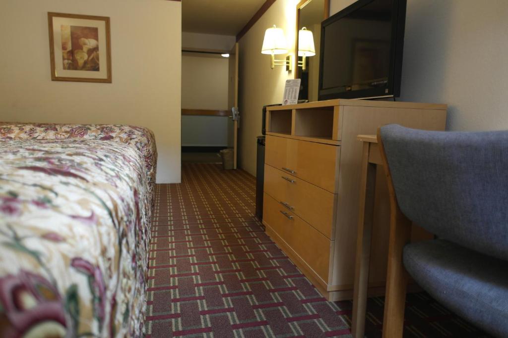 Postel nebo postele na pokoji v ubytování Bellingham Lodge