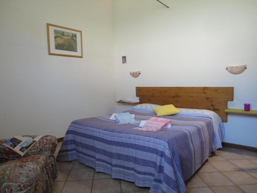 Posteľ alebo postele v izbe v ubytovaní Agriturismo Botro