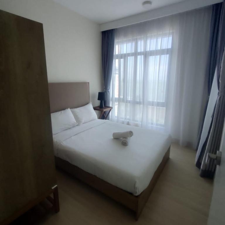 Cama ou camas em um quarto em Timurbay - Not Active