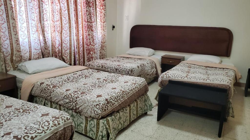 Postel nebo postele na pokoji v ubytování Student House