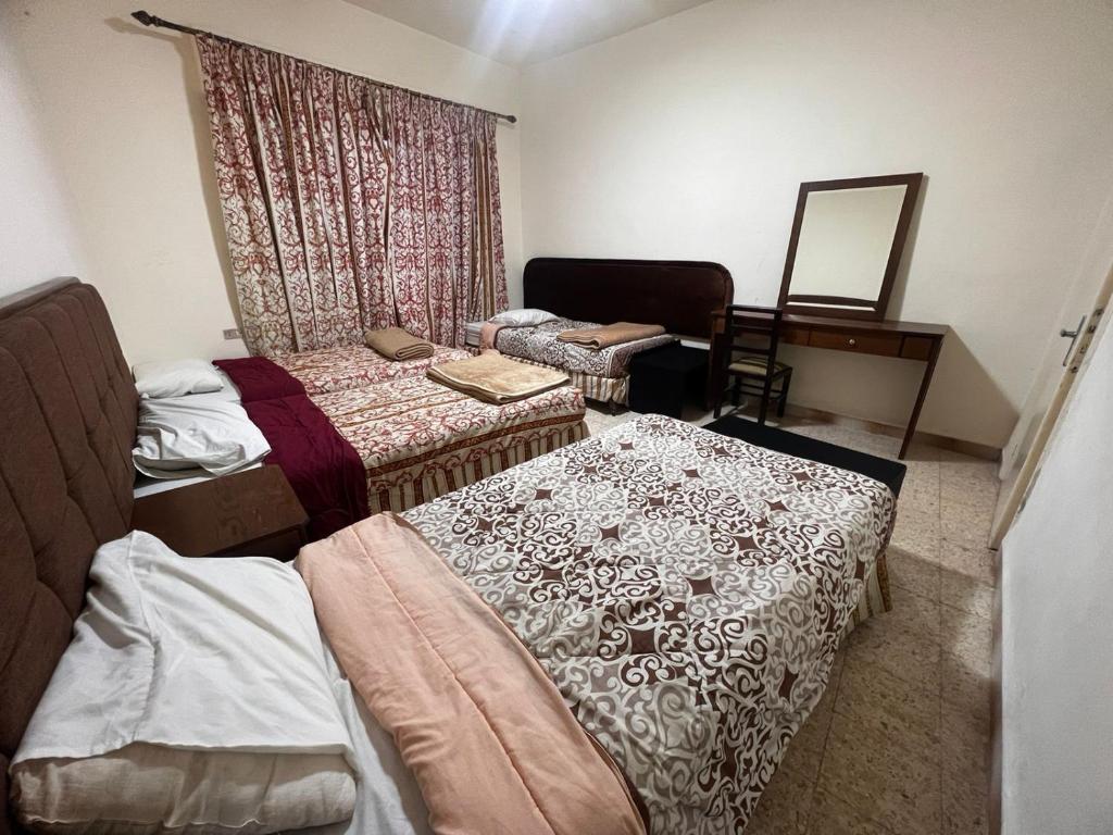 Postel nebo postele na pokoji v ubytování Student House