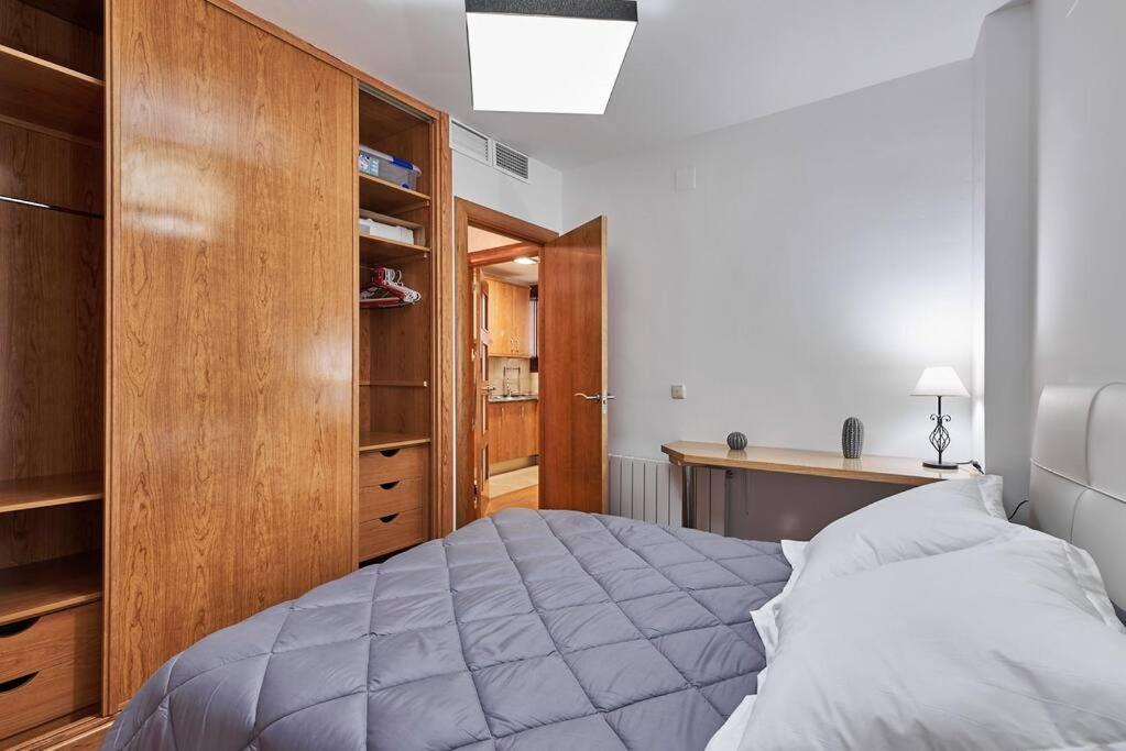 A bed or beds in a room at Deluxe Apartment Granada