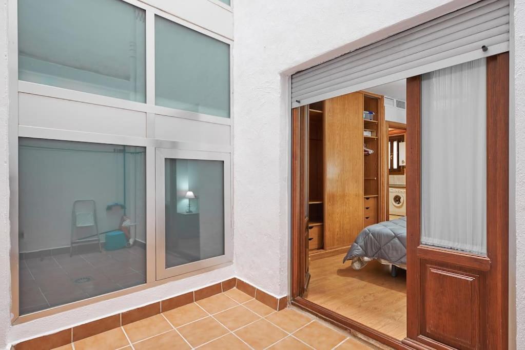 A bed or beds in a room at Deluxe Apartment Granada
