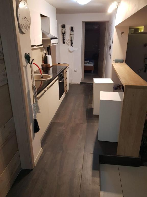 Kuchyň nebo kuchyňský kout v ubytování Apartments Kalaba - Dalma II
