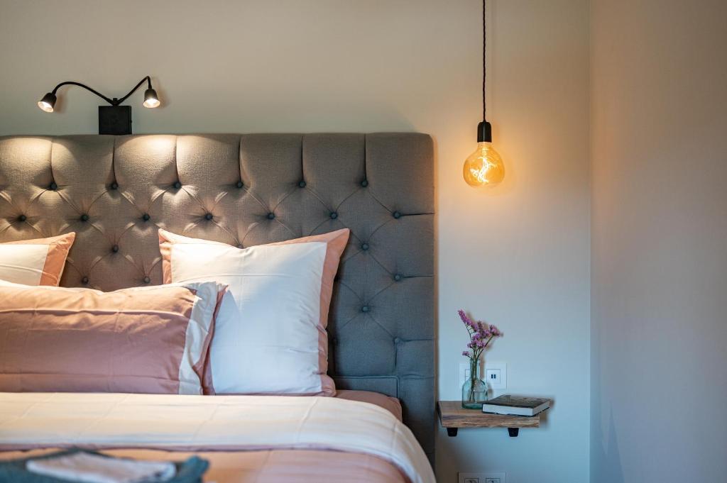 Postel nebo postele na pokoji v ubytování B&B 't Kloosterveld