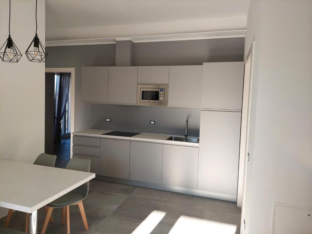 Kuchyň nebo kuchyňský kout v ubytování La Casa in Rivalta