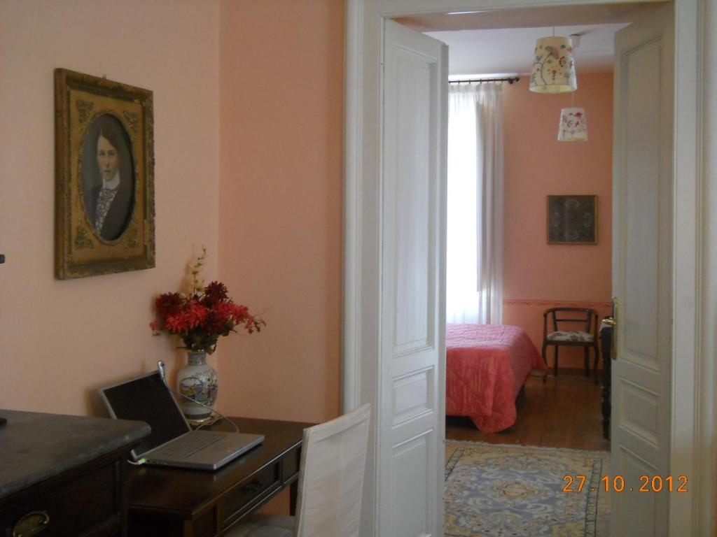 Televízia a/alebo spoločenská miestnosť v ubytovaní Villa D'Azeglio