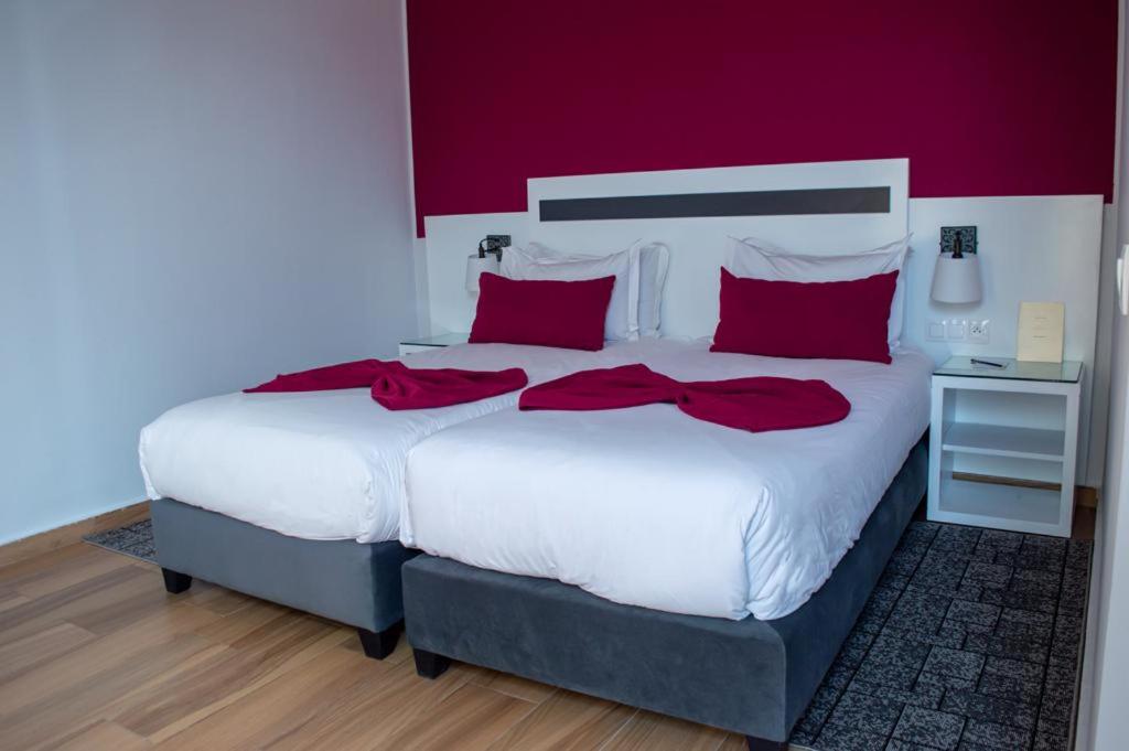 Postel nebo postele na pokoji v ubytování Hotel Le Musée