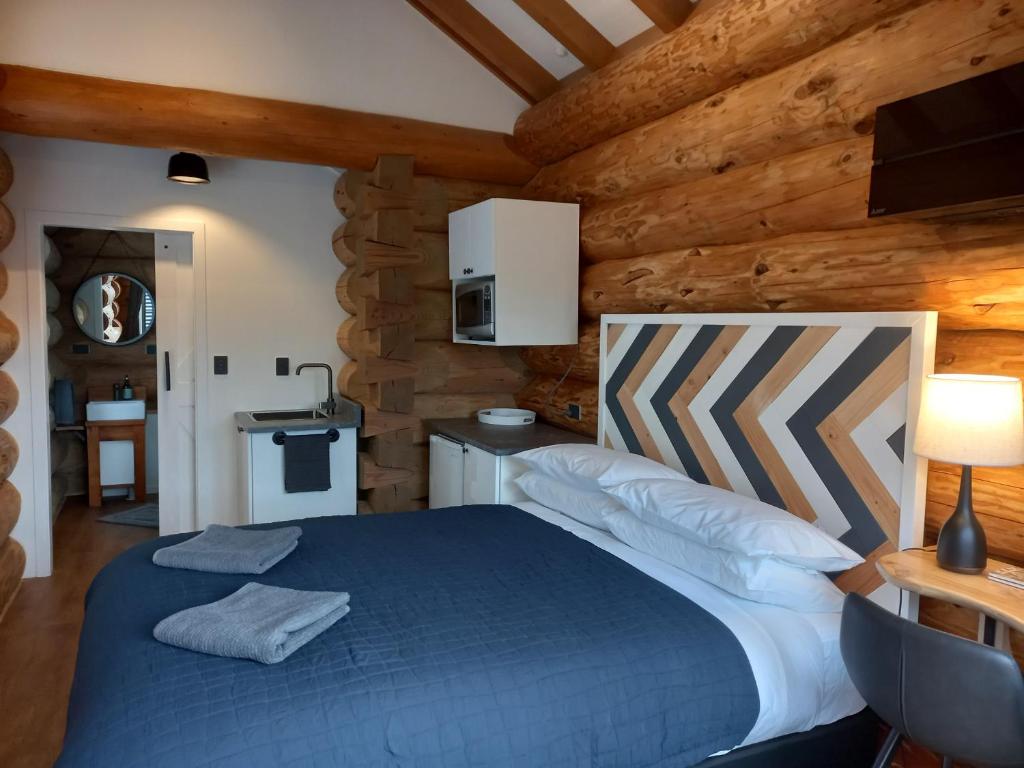 Postel nebo postele na pokoji v ubytování The Cabin