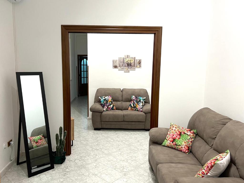 A seating area at Gabry central apartment Palermo