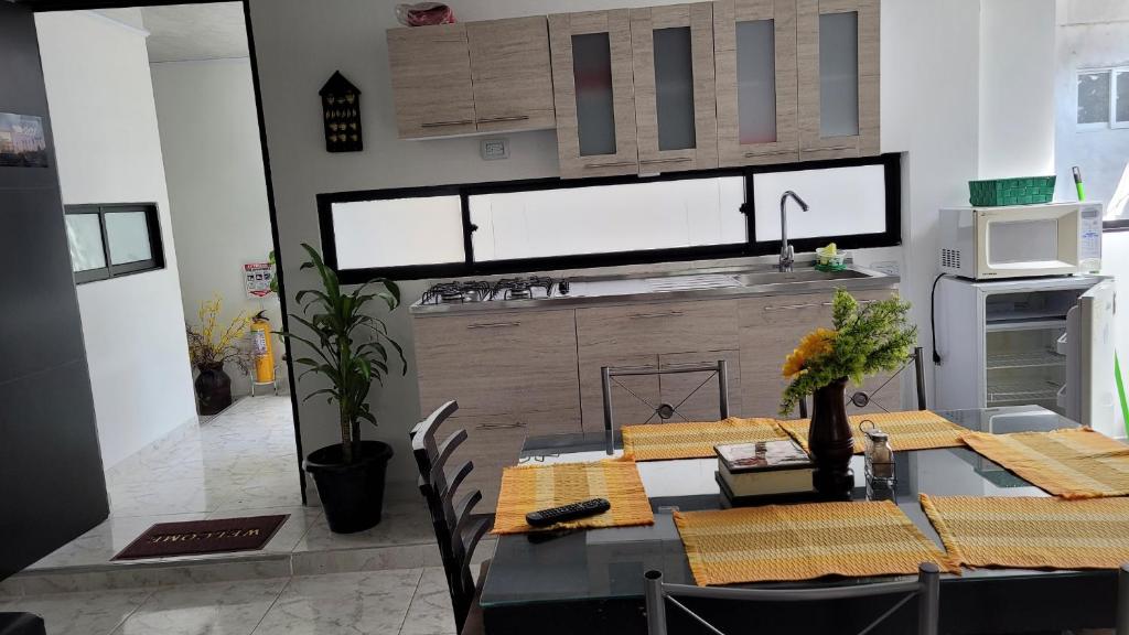 Kuchyň nebo kuchyňský kout v ubytování Apartamentos El Caudal, Villavicencio