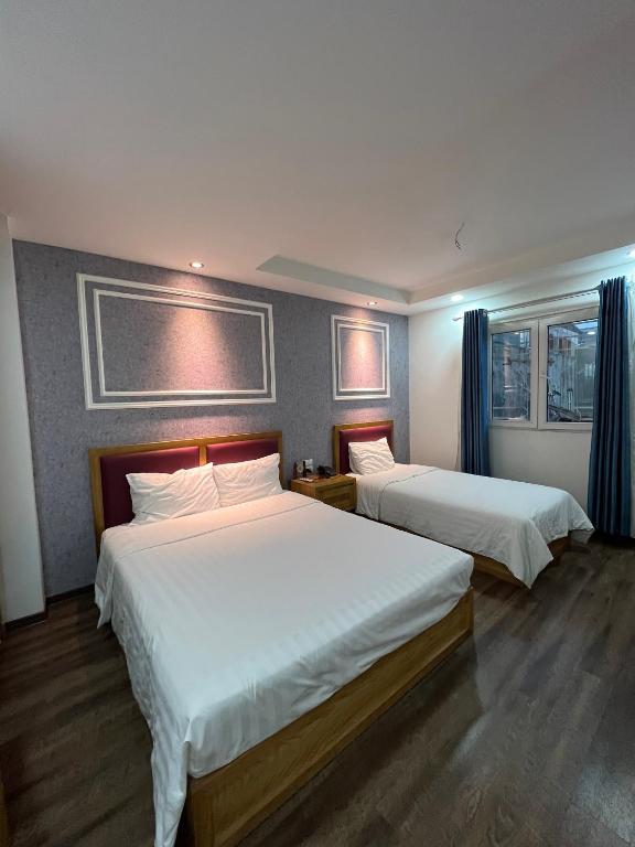 Postel nebo postele na pokoji v ubytování Holiday Suites Hotel & Spa