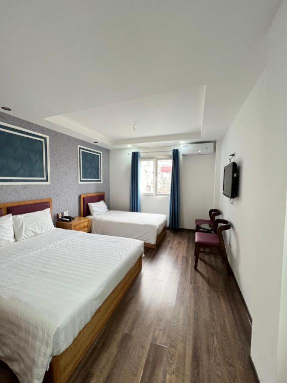 Postel nebo postele na pokoji v ubytování Holiday Suites Hotel & Spa