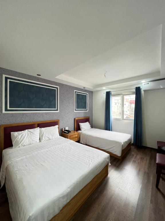 Postel nebo postele na pokoji v ubytování Holiday Suites Hotel & Spa