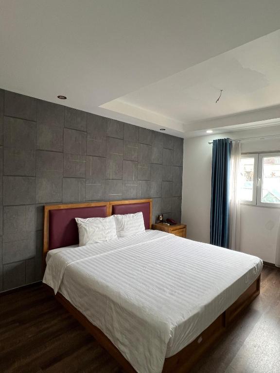 Postel nebo postele na pokoji v ubytování Holiday Suites Hotel & Spa