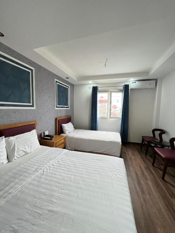 Postel nebo postele na pokoji v ubytování Holiday Suites Hotel & Spa
