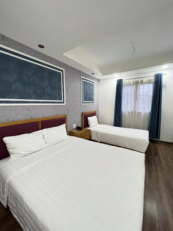 Postel nebo postele na pokoji v ubytování Holiday Suites Hotel & Spa