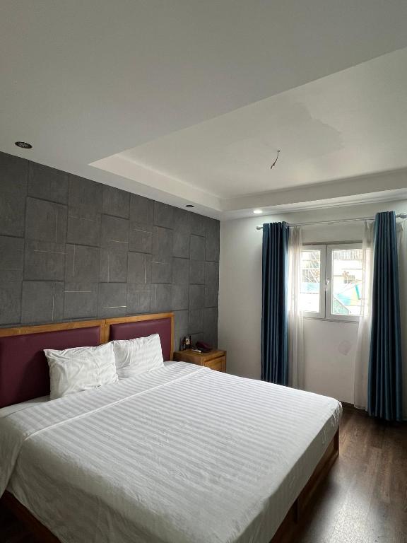 Postel nebo postele na pokoji v ubytování Holiday Suites Hotel & Spa