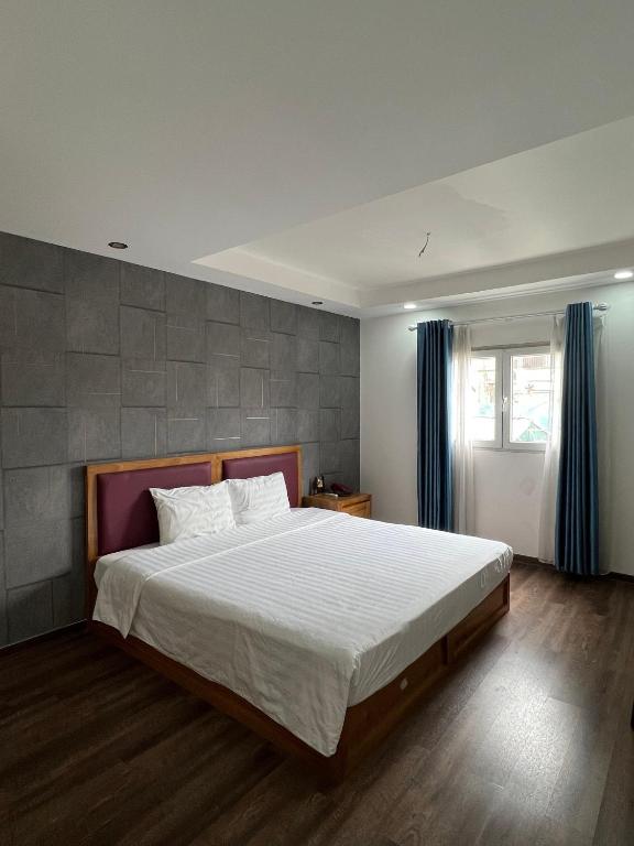 Postel nebo postele na pokoji v ubytování Holiday Suites Hotel & Spa