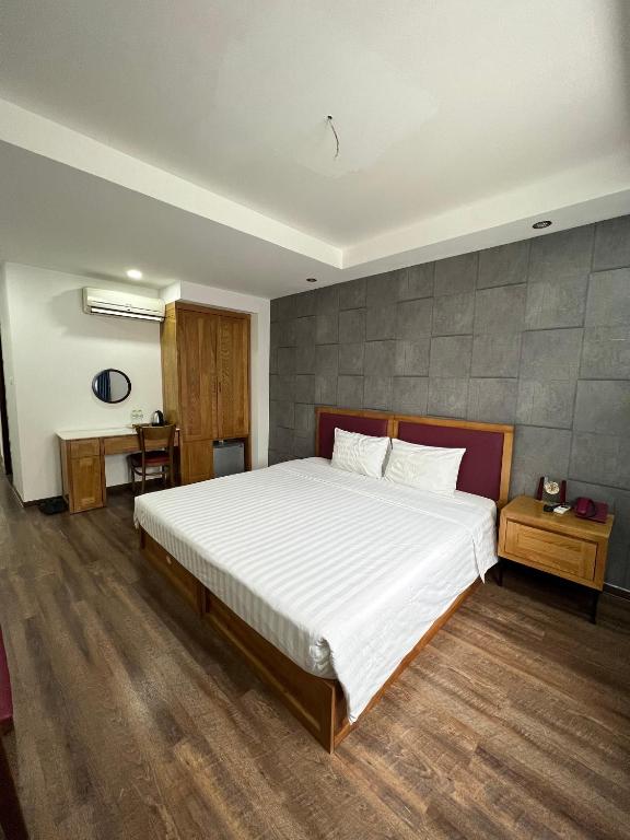 Postel nebo postele na pokoji v ubytování Holiday Suites Hotel & Spa