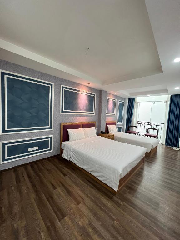 Postel nebo postele na pokoji v ubytování Holiday Suites Hotel & Spa