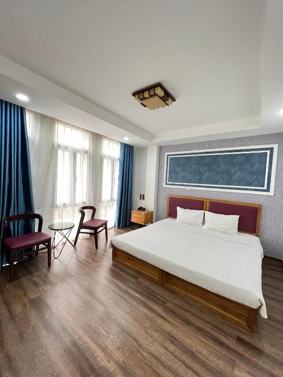 Postel nebo postele na pokoji v ubytování Holiday Suites Hotel & Spa