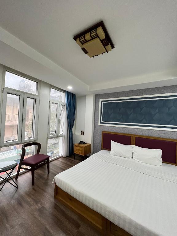 Postel nebo postele na pokoji v ubytování Holiday Suites Hotel & Spa