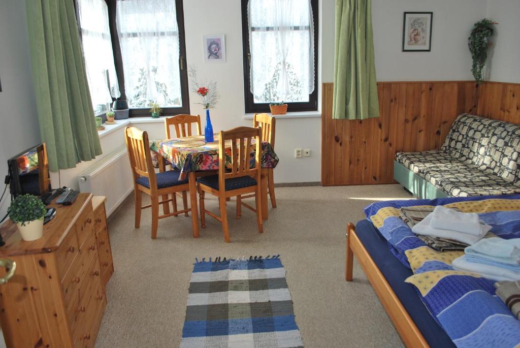 Łóżko lub łóżka w pokoju w obiekcie M+M Apartmán