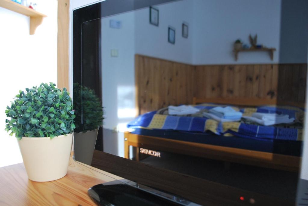 Telewizja i/lub zestaw kina domowego w obiekcie M+M Apartmán