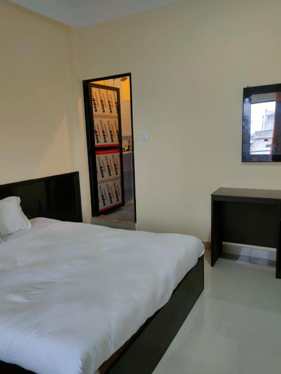 Postel nebo postele na pokoji v ubytování Kavre Guest House