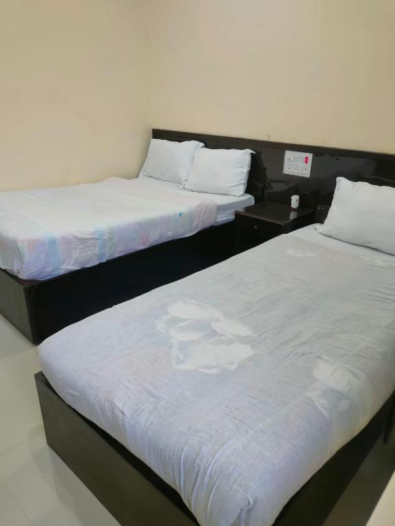 Postel nebo postele na pokoji v ubytování Kavre Guest House