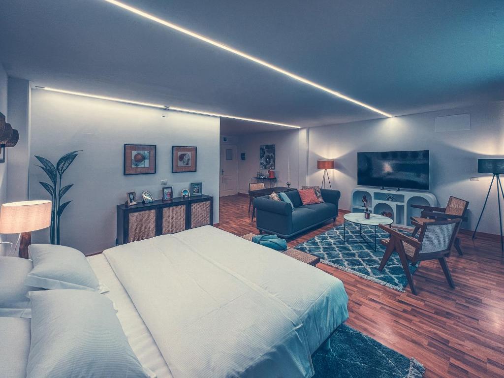 TV a/nebo společenská místnost v ubytování Club del Sole Tenuta Primero Hotel