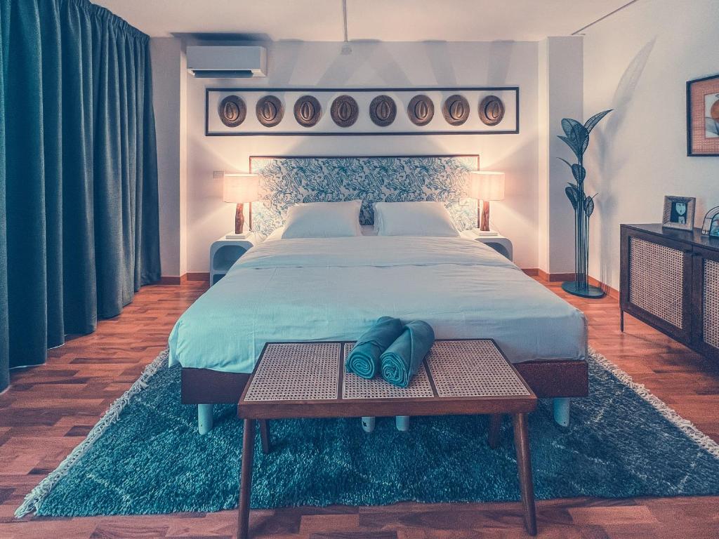 Postel nebo postele na pokoji v ubytování Club del Sole Tenuta Primero Hotel