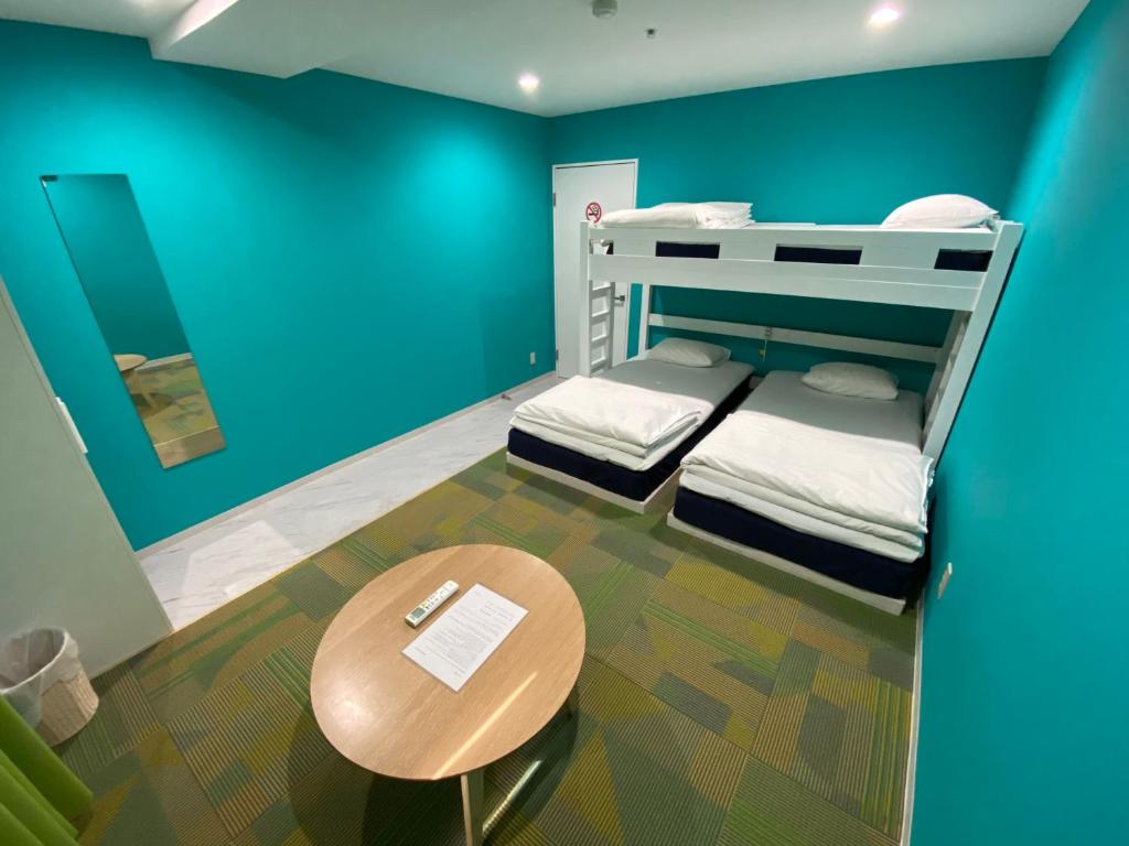 Postel nebo postele na pokoji v ubytování Hostel Anchorage