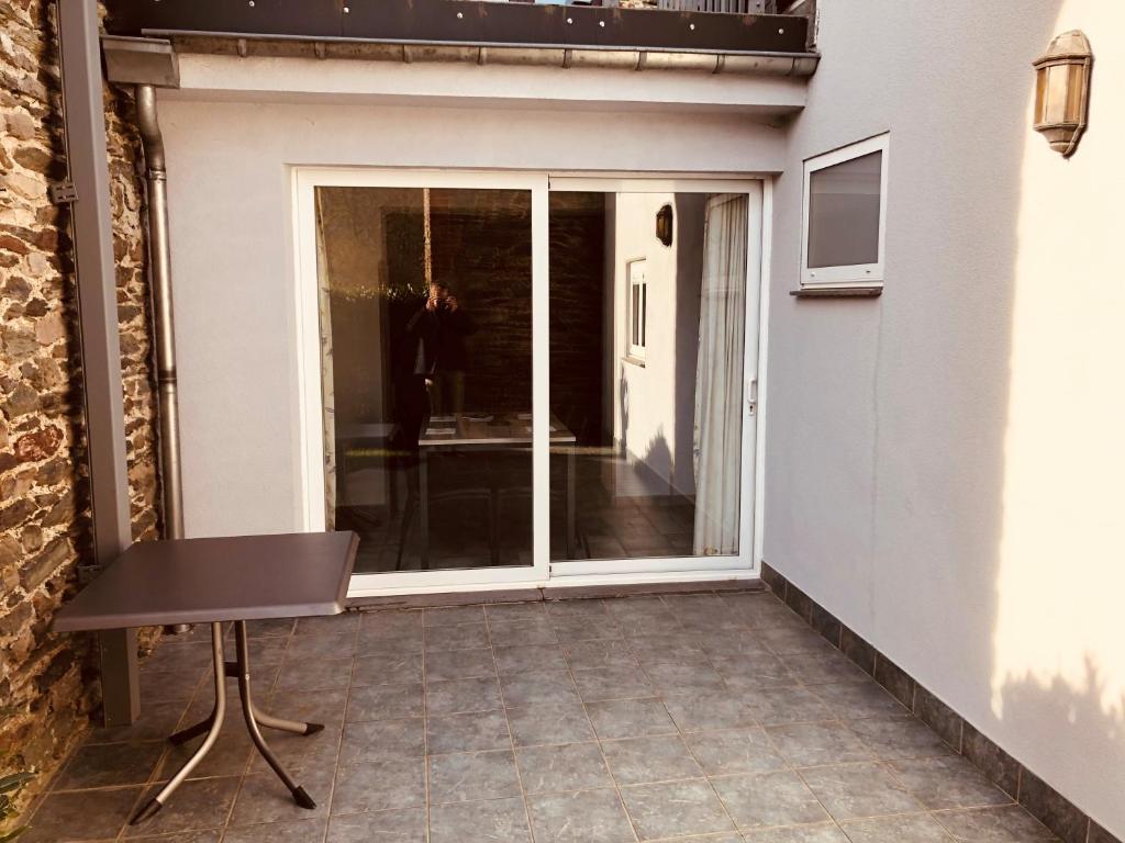 Balkón nebo terasa v ubytování Appart Hotel Au Pied de Vigne