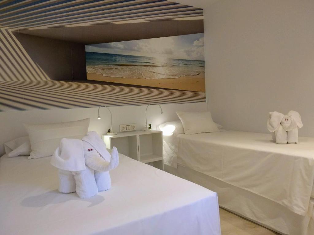 Postel nebo postele na pokoji v ubytování Casa Fuerte Playa