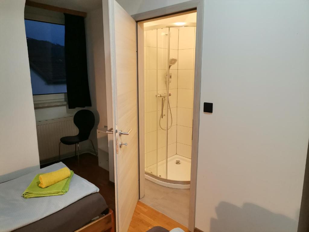 Uma cama ou camas num quarto em Pension Prem