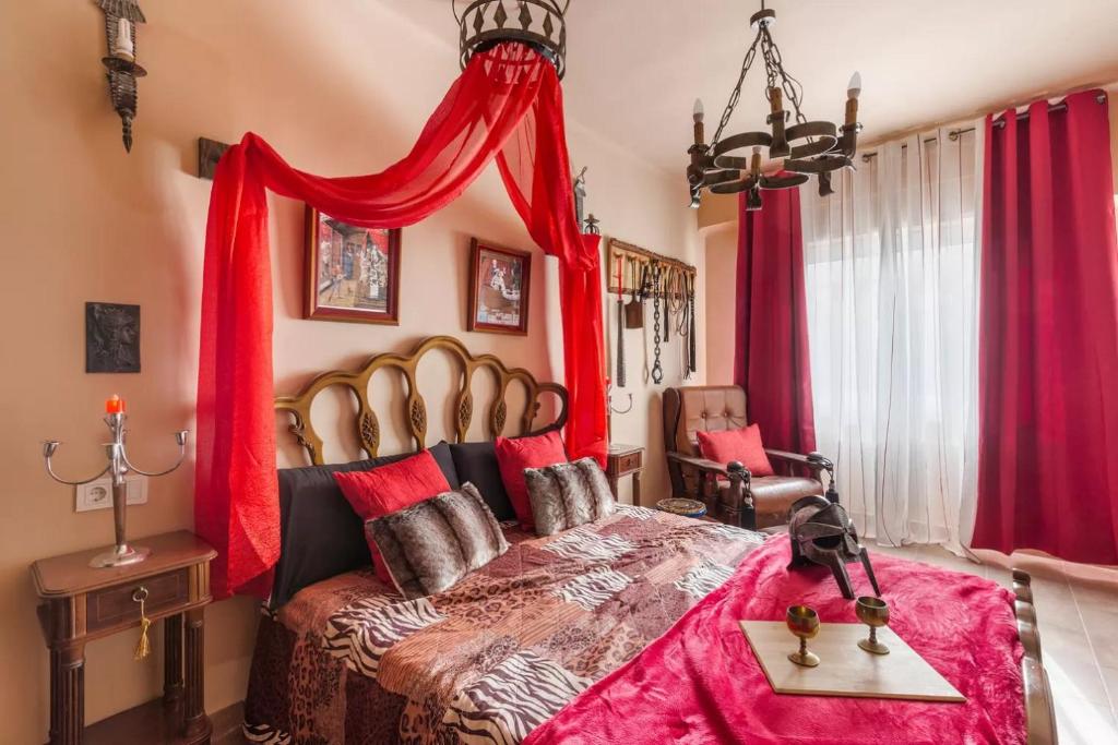 Postel nebo postele na pokoji v ubytování Torreón Carthago Spartaria Experiencias Carthago Tematizadas