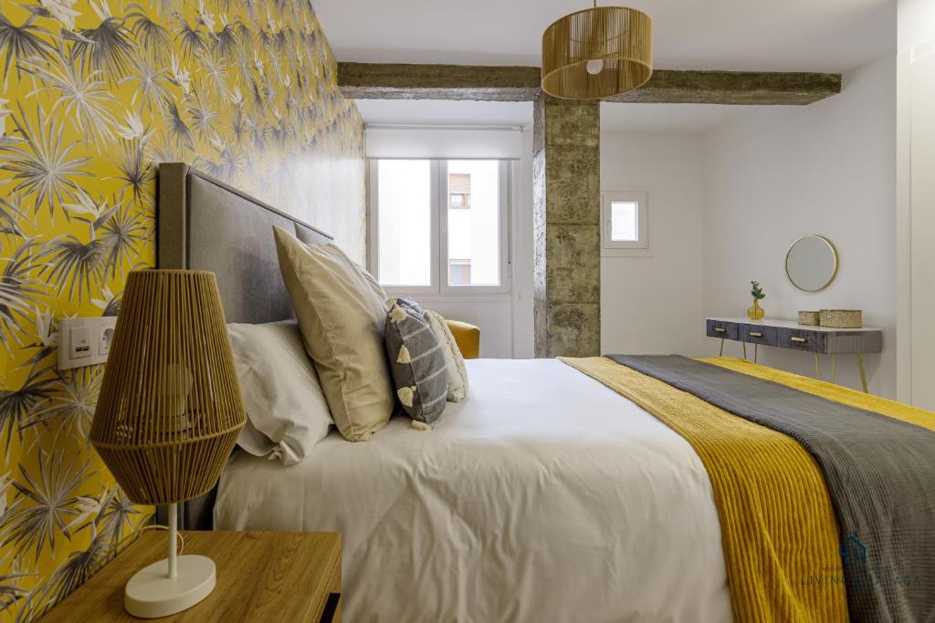 Posteľ alebo postele v izbe v ubytovaní Living4Malaga Boho Chic Apartment