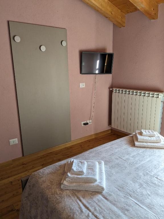 Postel nebo postele na pokoji v ubytování CONSTANCIA TRATTORIA