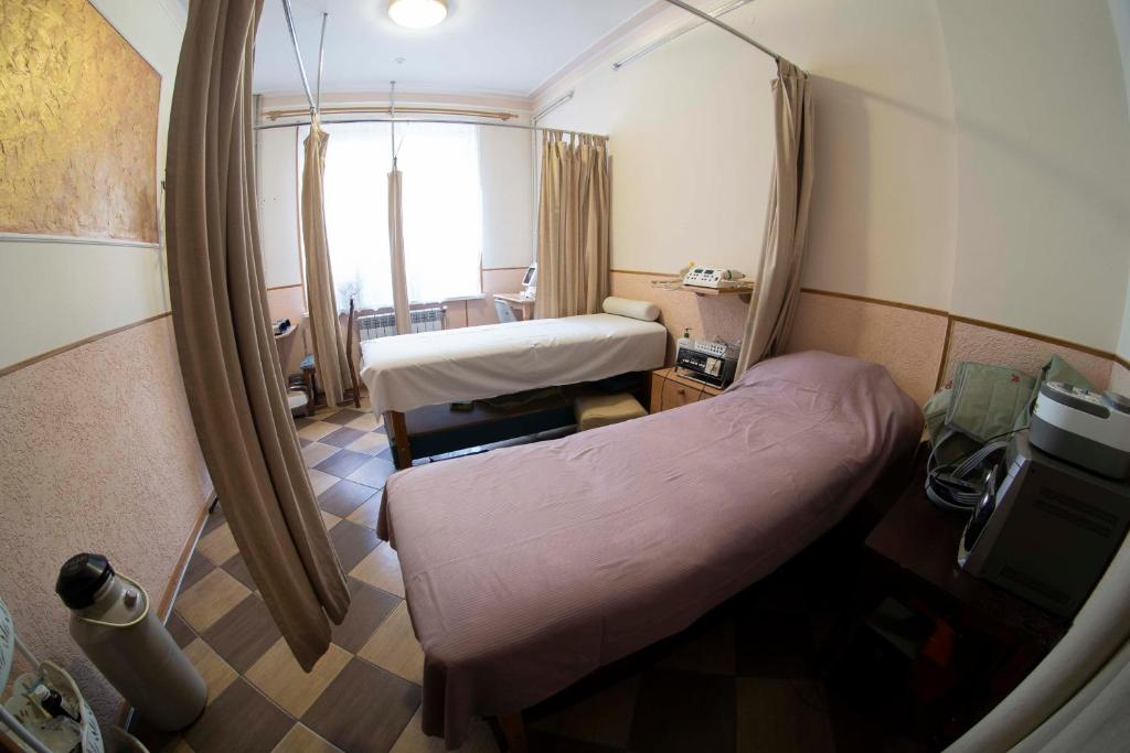 Postel nebo postele na pokoji v ubytování SPA Villa Jasmin
