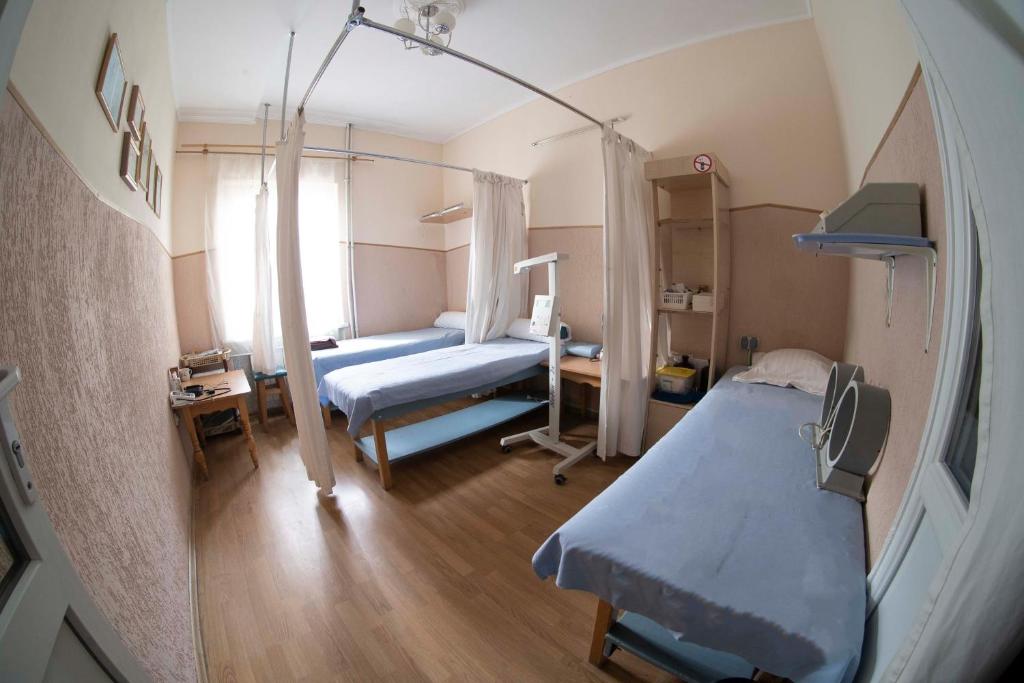 Postel nebo postele na pokoji v ubytování SPA Villa Jasmin