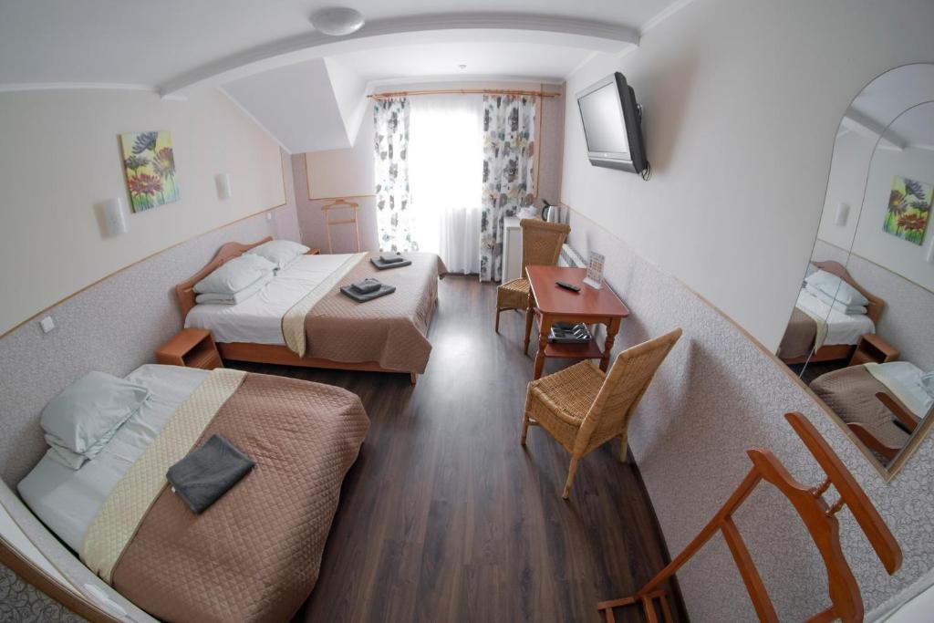 Postel nebo postele na pokoji v ubytování SPA Villa Jasmin