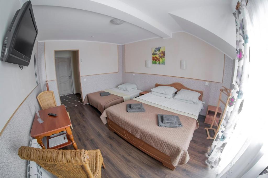 Postel nebo postele na pokoji v ubytování SPA Villa Jasmin