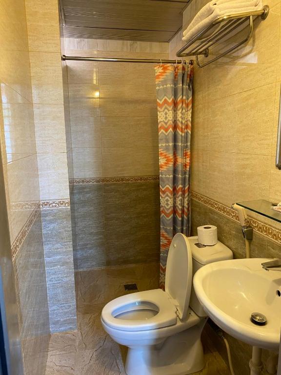 Koupelna v ubytování Kim Hotel