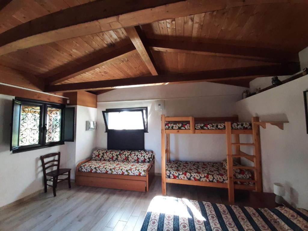 Postel nebo postele na pokoji v ubytování Tenuta Le Tre Querce