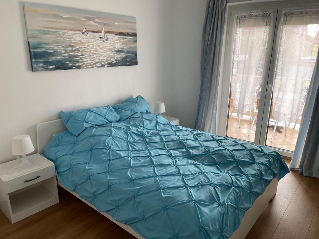 Postel nebo postele na pokoji v ubytování Apartment Kati