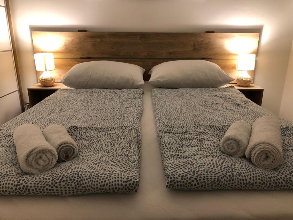 Postel nebo postele na pokoji v ubytování Apartment Aura